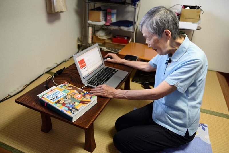 This picture taken on July 13, 2017 shows 82-year-old programmer Masako Wakamiya using her laptop in her home in Fujisawa, Kanagawa prefecture.
When 82-year-old Masako Wakamiya first began working she still used an abacus for maths -- today she is one of the world's oldest iPhone app developers, a trailblazer in making smartphones accessible for the elderly. / AFP PHOTO / Kazuhiro NOGI / TO GO WITH Japan-tech-elderly,FEATURE by Karyn NISHIMURA-POUPEE