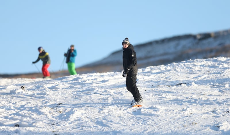 A man snowboarding at the volunteer ran Ski-Allenheads as the cold weather continues in Northumberland. Reuters