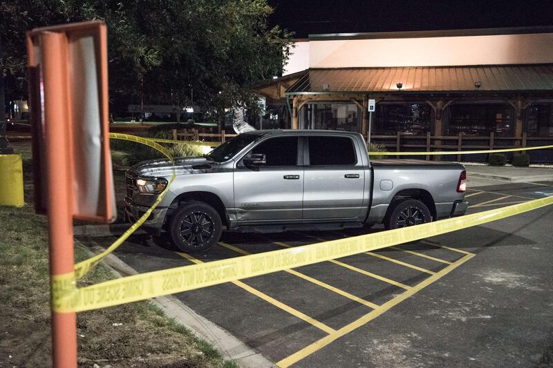 Police tape marks the scene outside a Twin Peaks restaurant after multiple people were shot  in Odessa, Texas. Officials say an unidentified suspect was shot and killed after killing 5 people and injuring 21 in Odessa and nearby Midland.   AFP