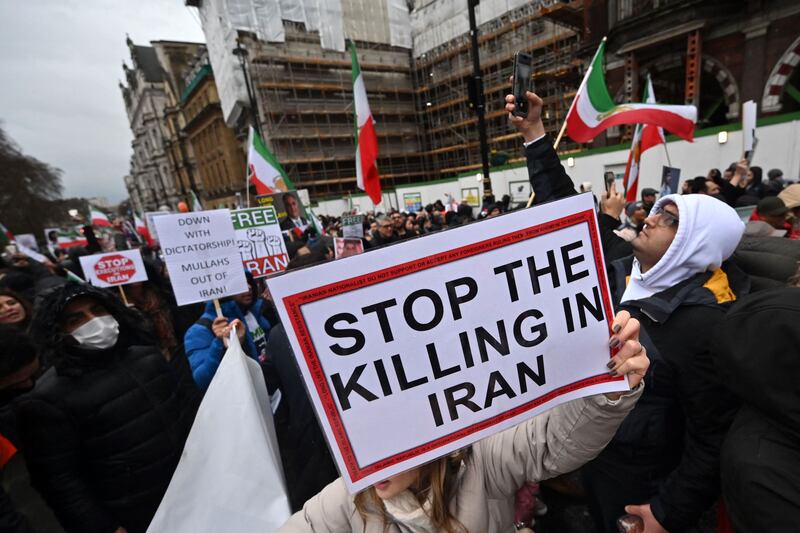 People protesting against the Iranian regime at a rally in London. The UK Prime Minister is under fire over issues in Iran. AFP