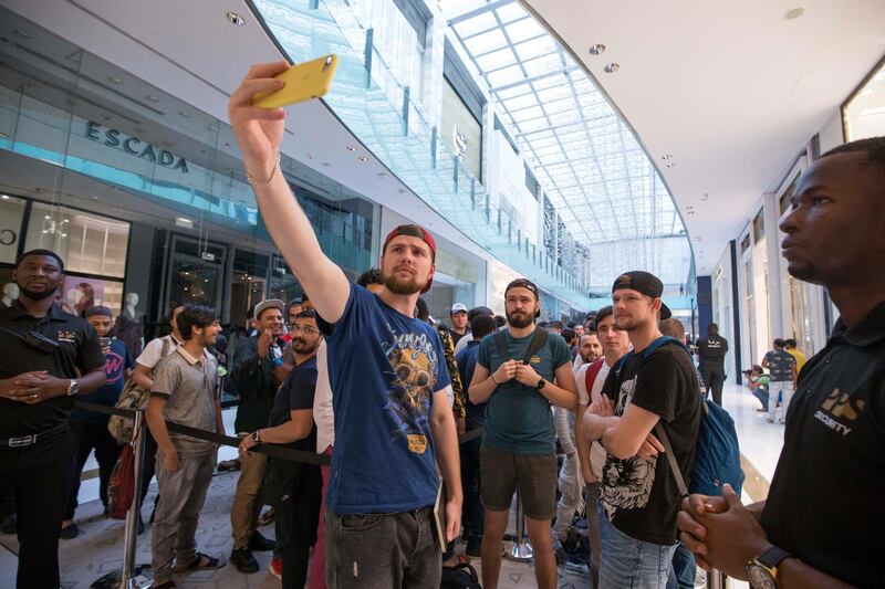 DUBAI, UNITED ARAB EMIRATES, 21 SEPTEMBER 2018 - Crowd at Iphone XS launch at Apple store Dubai Mall.  Leslie Pableo for The National