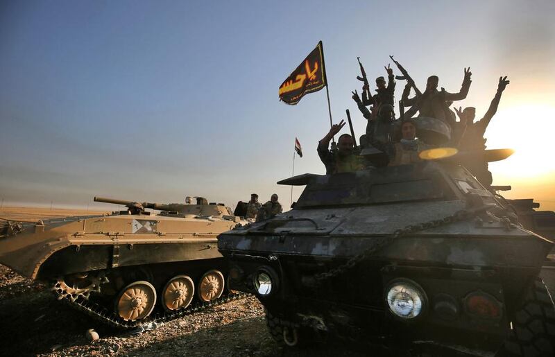 Iraqi forces deployed in Al Shourah, 45km south of Mosul. Ahmad Al Rubaye / AFP Photo