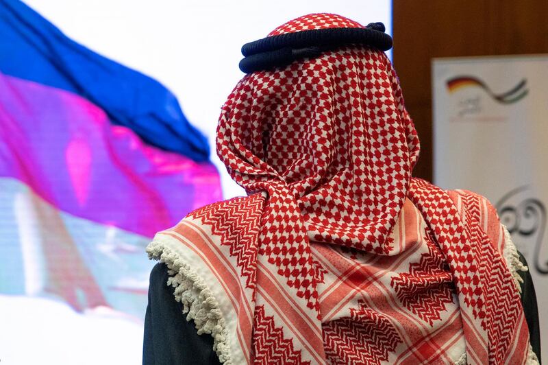 A Jordanian stands during the National Anthem at the opening ceremony of the Groundwater Resources of Jordan, in Amman. EPA