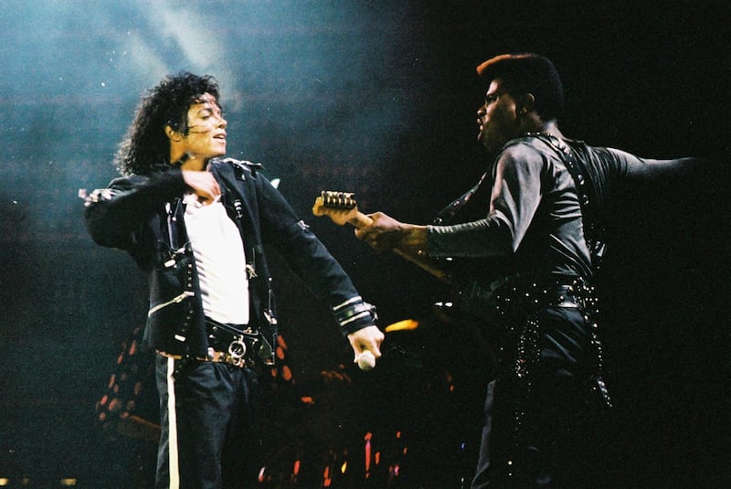 LONDON, UNITED KINGDOM - JULY 3: Michael Jackson and David Williams perform on stage on his BAD tour at Wembley Stadium on July 3rd 1988 in London, United Kingdom. (Photo by Peter Still/Redferns/Getty Images)