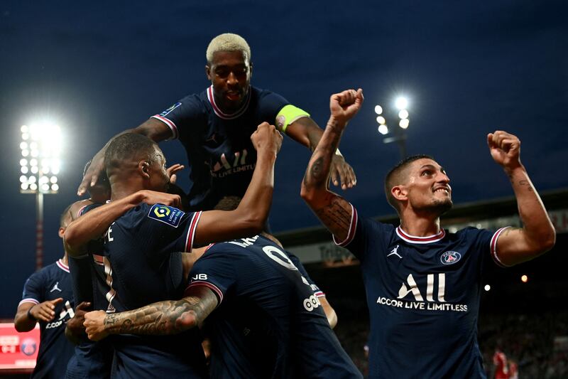 French forward Kylian Mbappe celebrates with Presnel Kimpembe, Mauro Icardi snd Marco Verratti after scoring in PSG's 4-2 victory. AFP