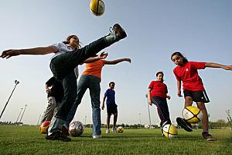 Aspiring women's footballers at the American University are encouraged to put their best foot forward by football director Lee Mitchell.