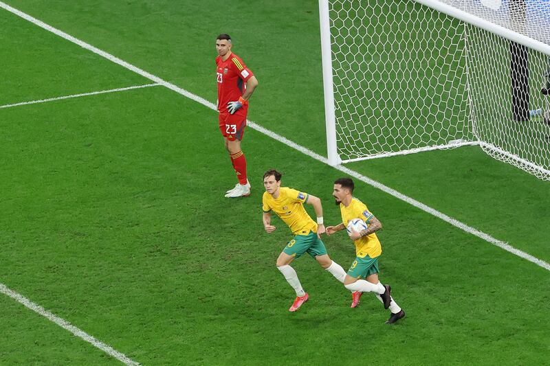 Australia's Craig Goodwin collects the ball after his deflected shot made it 2-1. Getty