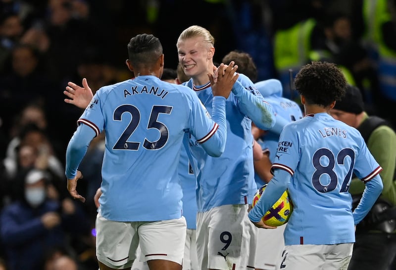 Manchester City's Erling Haaland, Rico Lewis and Manuel Akanji celebrate their first goal scored by Riyad Mahrez. Reuters