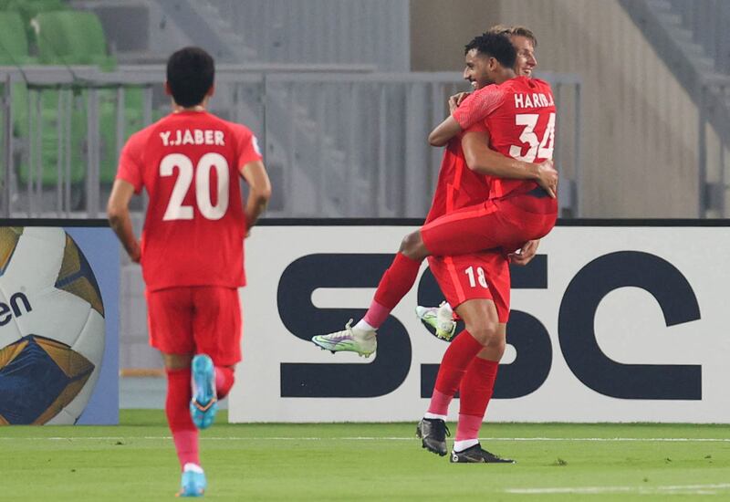 Thomas Lehne Olsen celebrates his opening goal with Shabab Al Ahli teammates. AFP