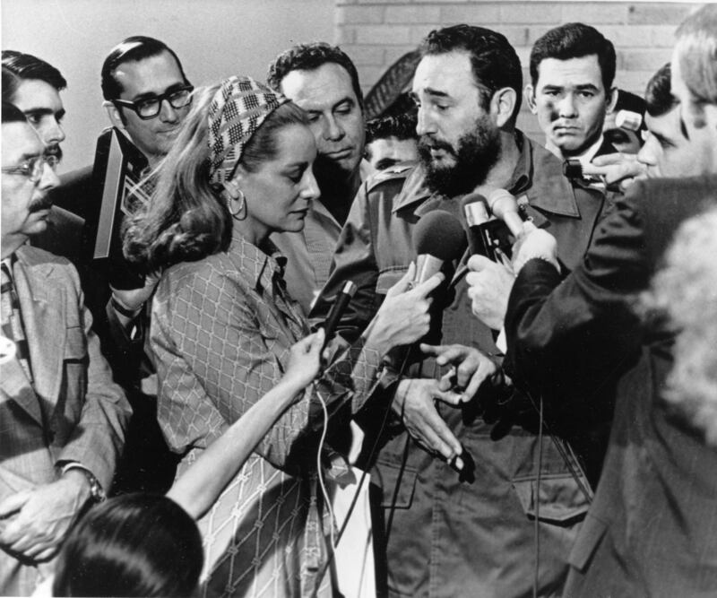 Cuba's celebrated leader Fidel Castro, centre right, interviewed by Walters, centre left, in 1975. AP Photo