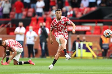 MANCHESTER, ENGLAND - SEPTEMBER 11: Cristiano Ronaldo of Manchester United shoots as he warms up prior to the Premier League match between Manchester United and Newcastle United at Old Trafford on September 11, 2021 in Manchester, England. (Photo by Clive Brunskill / Getty Images)