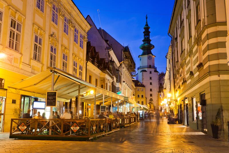Streetside cafes and bars line the pedestrian-only streets of the old town in Bratislava, Slovakia. People can be seen drinking in the bars in the early evening. (iStockphoto.com)