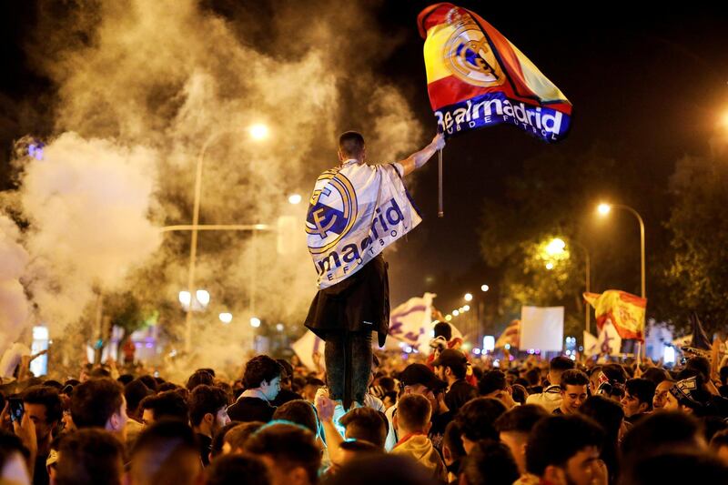 Real Madrid fans celebrate near the Cibeles fountain in central Madrid. Paul Hanna / Reuters