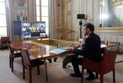 French President Emmanuel Macron takes part in an Online G7 meeting, in Paris, France February 19, 2021. Thibault Camus/Pool via REUTERS