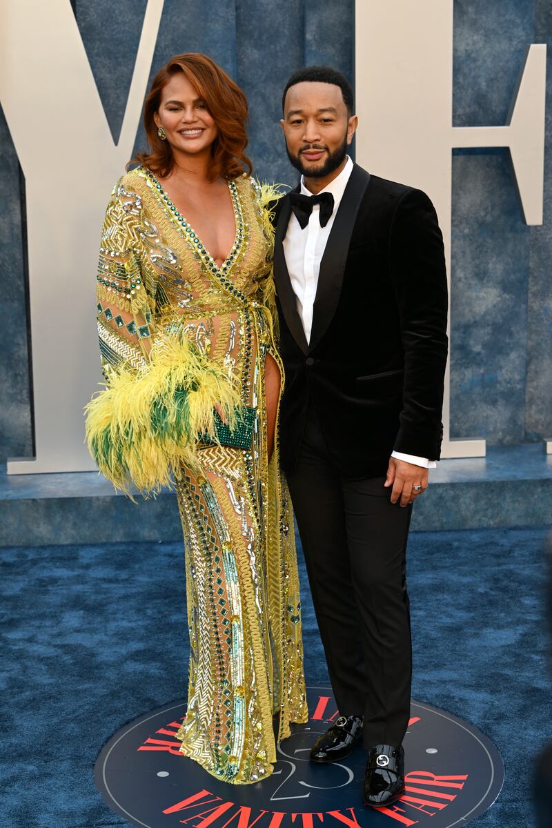 Chrissy Teigen in Zuhair Murad, with husband John Legend. Photo: Doug Peters