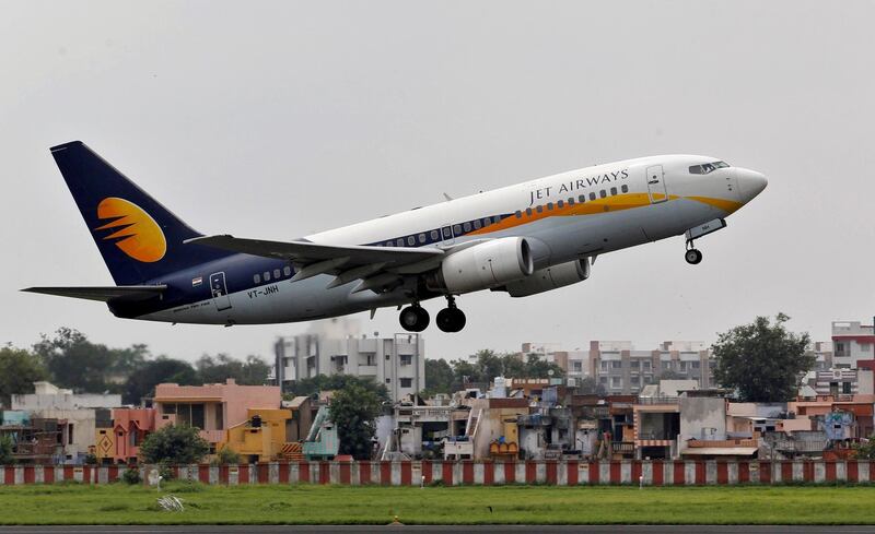 FILE PHOTO: A Jet Airways passenger aircraft takes off from the airport in the western Indian city of Ahmedabad, India, August 12, 2013. REUTERS/Amit Dave/File Photo