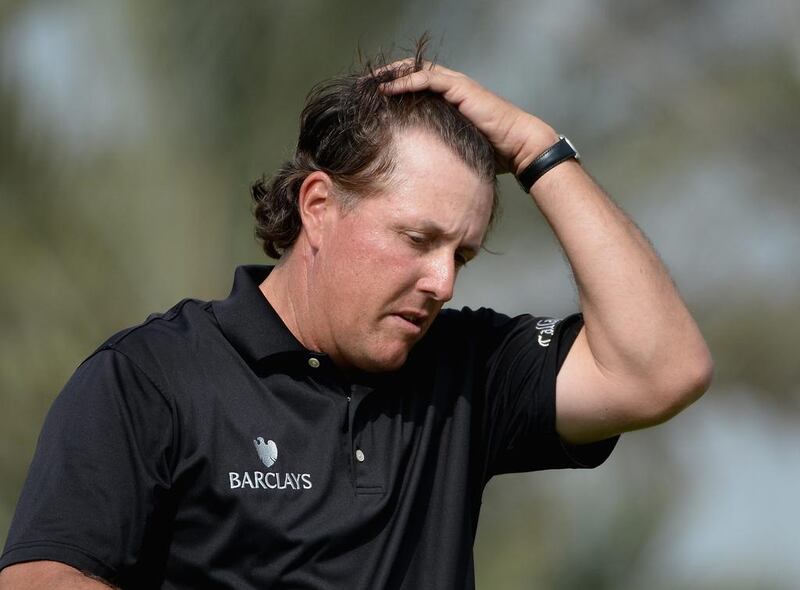 Phil Mickelson was able to laugh off his misadventures at the 13th hole that likely cost him the tournament.  Ross Kinnaird / Getty Images