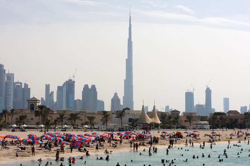 
DUBAI , UNITED ARAB EMIRATES  Ð  Nov 6 : People enjoying on the first day of Eid holiday at Jumeirah open beach in Dubai. ( Pawan Singh / The National ) For News.
