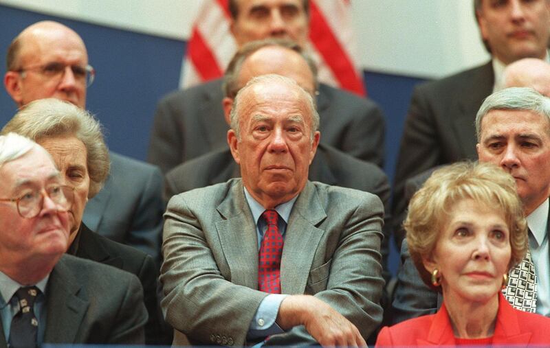 George Shultz,  former US First Lady Nancy Reagan and Senator Daniel Patrick Moynihan listen to speakers during dedication ceremonies of the new Ronald Reagan Building and International Trade Centre in Washington on May 5, 1998. AFP