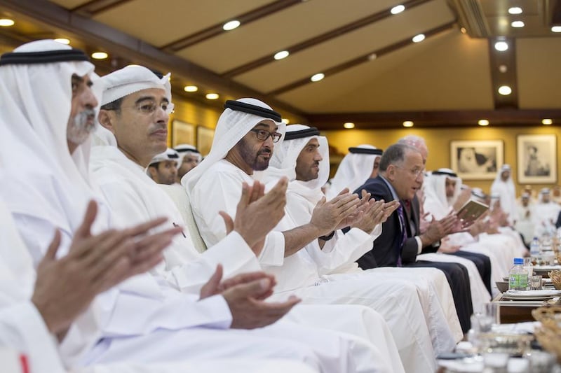 Sheikh Mohammed bin Zayed, Crown Prince of Abu Dhabi and Deputy Supreme Commander of the UAE Armed Forces (3rd left), applauds after a lecture by Jeffrey Immelt, chairman and chief executive officer of General Electric (not shown) at the Al Bateen palace. Mr Immelt talked about the importance of focusing on education training and SMEs. Ryan Carter / Crown Prince Court - Abu Dhabi 