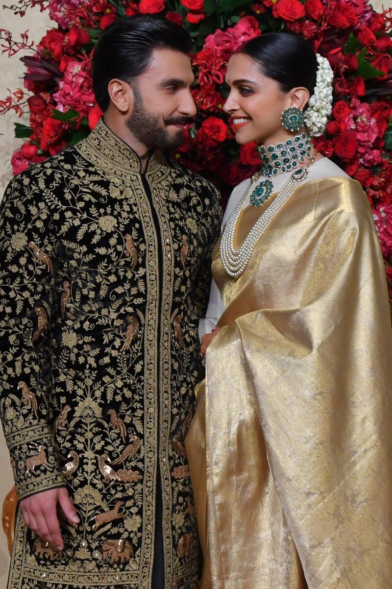 They've flown back from their glamorous Lake Como wedding, and on Wednesday Deepika Padukone and Ranveer Singh celebrated their union again at a reception party in Bengaluru at the five-star Leela Palace hotel. Photo / AP