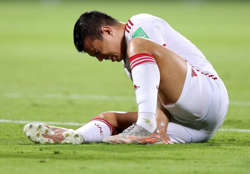 UAE's Fabio De Lima looks in pain during the game between the UAE and Vietnam in the World cup qualifiers at the Zabeel Stadium, Dubai on June 15th, 2021. Chris Whiteoak / The National. Reporter: John McAuley for Sport