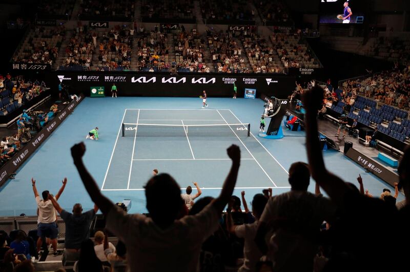 Fans celebrate during the second round match between Nick Kyrgios and Ugo Humbert. Reuters