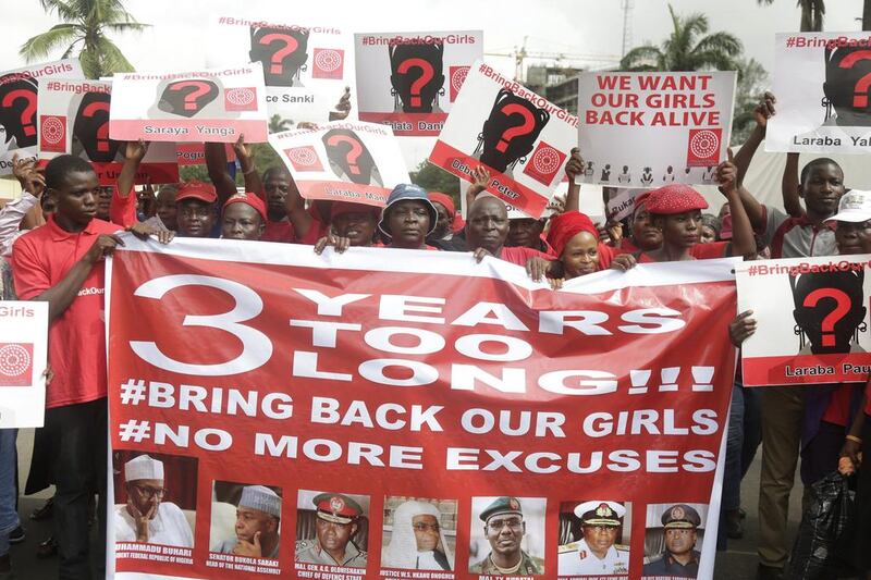 Bring back our girls campaigners in Lagos, Nigeria on April 13, 2017, call on the government to rescue the remaining kidnapped girls who were abducted from Chibok school three years ago by Boko Haram extremists. Sunday Alamba / AP 