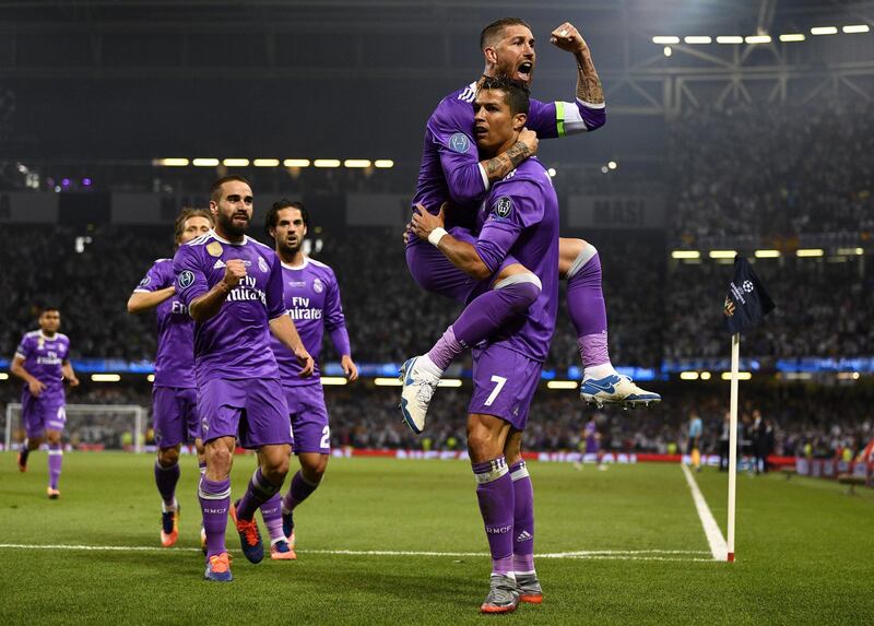 CARDIFF, WALES - JUNE 03:  Cristiano Ronaldo of Real Madrid celebrates scoring his sides first goal with Sergio Ramos of Real Madrid during the UEFA Champions League Final between Juventus and Real Madrid at National Stadium of Wales on June 3, 2017 in Cardiff, Wales.  (Photo by David Ramos/Getty Images)
