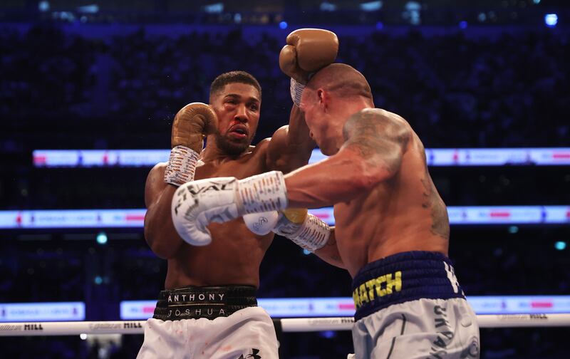Oleksandr Usyk and Anthony Joshua during their title bout. Getty