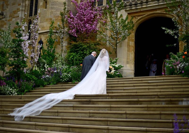Lady Gabriella Windsor and her father make their way into St George's Chapel in Windsor Castle. AFP