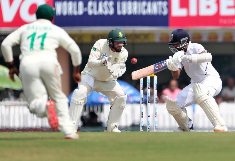 South Africa wicketkeeper Heinrich Klaasen ready to catch out India batsman Ajinkya Rahane. AP