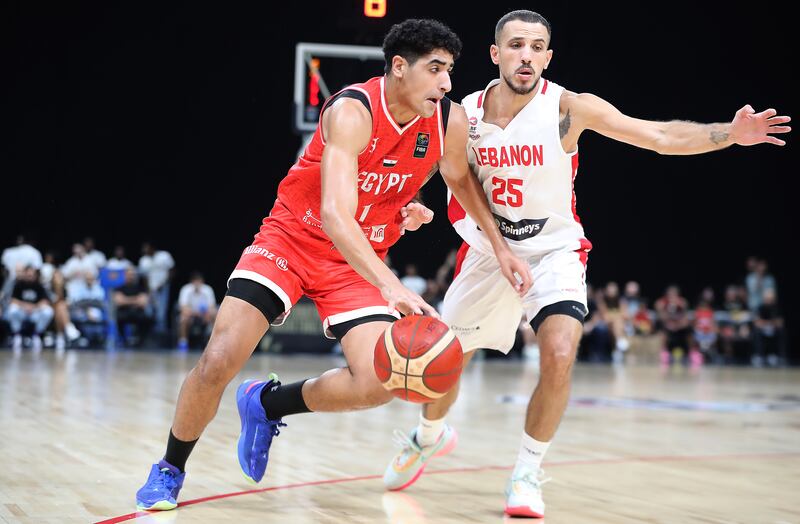 Egypt (in red) take on Lebanon (white) during the International Basketball Week in Abu Dhabi on August 17 2023. Pawan Singh / The National