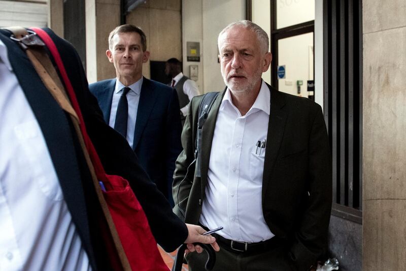 epa06996878 British Labour Party Leader Jeremy Corbyn (R) and Seumas Milne (L), Labour Party's Executive Director of Strategy and Communications leave the British Labour Party headquarters in London, Britain, 04 September 2018. Labour's NEC (National Executive Committee) has approve the adoption international definition of anti-Semitism into Labour's code of conduct at Labour headquarters.  EPA/WILL OLIVER