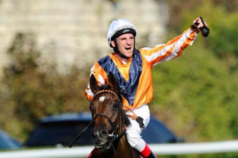 Andrasch Starke, riding Danedream, in orange, wins the Prix de l’Arc de Triomphe at Longchamp in Paris yesterday.