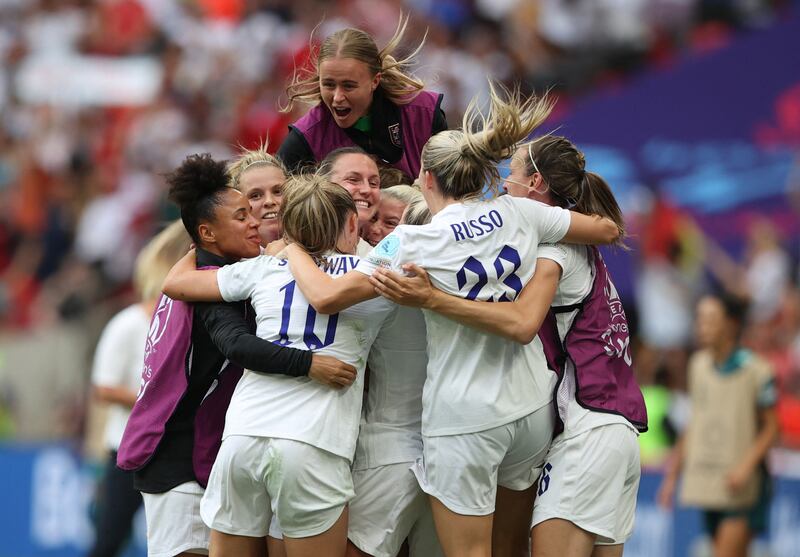 England's Ella Toone celebrates with teammates. Reuters