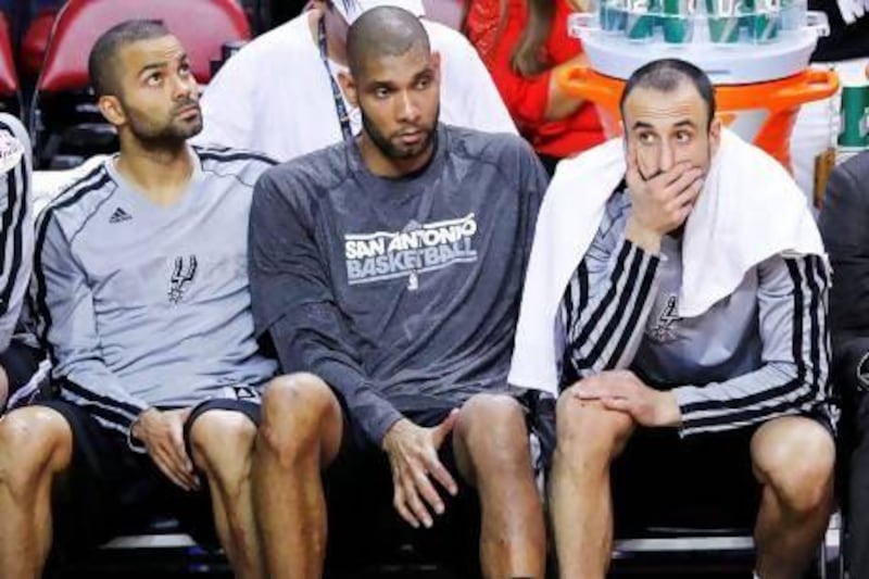 San Antonio Spurs' Tony Parker, left, Tim Duncan and Manu Ginobili combined for only 27 points in a Game 2 loss to Miami Heat. Joe Skipper / Reuters