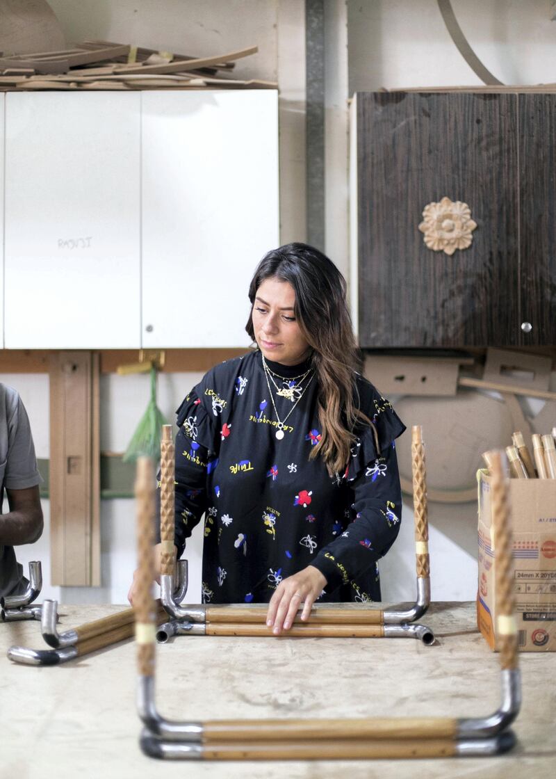 SHARJAH, UNITED ARAB EMIRATES. 7 SEPTEMBER 2019. 

Lana El Samman looks at a prototype of her table, produced in Aden Furniture & Wood factory.

Lana El Samman is currently a resident designer in Tashkeel’s Tanween program. The program is open to emerging designers, makers and artisans living and working in the UAE.


Lana El Samman is of Lebanese origin, and grew up in Beirut and later Canada, where she studied interior design followed by a Master’s degree at the Florence Institute of Design, Italy. Her career began as a teaching assistant at the American University of Sharjah before joining Sharjah Art Foundation, which has been her home for the past eight years working as an interior designer and then progressing to become a significant member of the production programme. In the SAF Production Programme, Samman has had the chance to further her furniture design practice and create pieces used by the Foundation for various events.

(Photo: Reem Mohammed/The National)

Reporter: KATE HAZELL
Section: WK