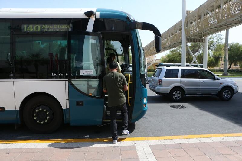 People using public buses in Abu Dhabi will have to use smart card from May 15 to pay for the journey. Fatima Al Marzooqi / The National