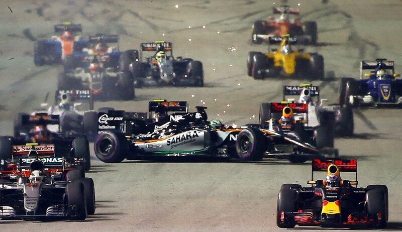 Nico Hulkenberg of Force India crashes at the start of the Formula One Singapore Grand Prix. Lynn Bo Bo / EPA