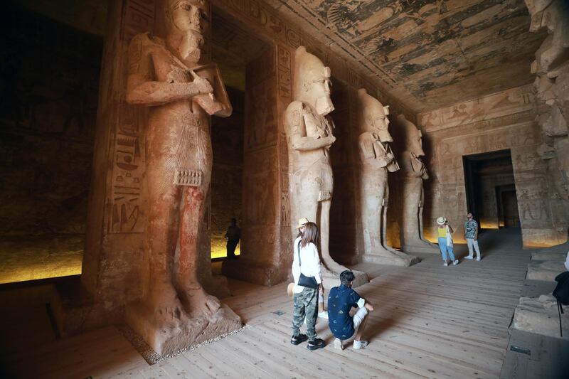 People visit the Ramses II temple in Abu Simbel, Egypt. Tourism in Egypt was affected by the Covid-19 pandemic. EPA