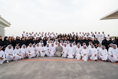 President Sheikh Mohamed meets some of the country's top performing students in a recent photo.