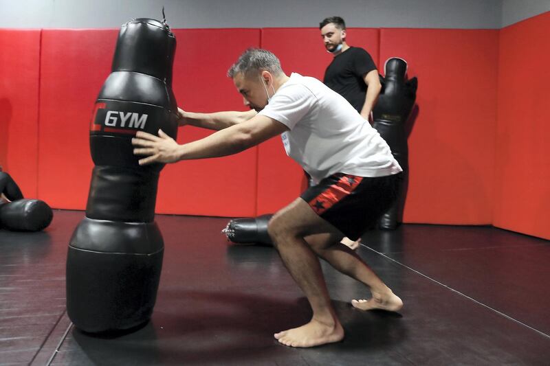 DUBAI, UNITED ARAB EMIRATES , August 10 – 2020 :- Robert Welsh from Teachers Social during the Brazilian Jiu Jitsu   session at the UFC Gym in Murjan 6 in Jumeirah Beach Residence in Dubai.  He is taking part in the 90 minutes MMA Mash up. (Pawan Singh / The National) For News/Online/Instagram. Story by Nick Webster