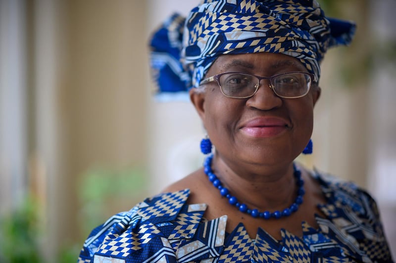 TOPSHOT - Nigeria's Ngozi Okonjo-Iweala poses for a picture at her home in Potomac, Maryland, near Washington DC, minutes before she is confirmed Monday as the first woman and first African leader of the beleaguered World Trade Organization,on February 15, 2021. The WTO has called a special general council meeting at which the former Nigerian finance minister and World Bank veteran was formally selected as the global trade body's new director-general. US President Joe Biden strongly swung behind her candidacy shortly after the only other remaining contender, South Korean Trade Minister Yoo Myung-hee, pulled out.
 / AFP / Eric BARADAT
