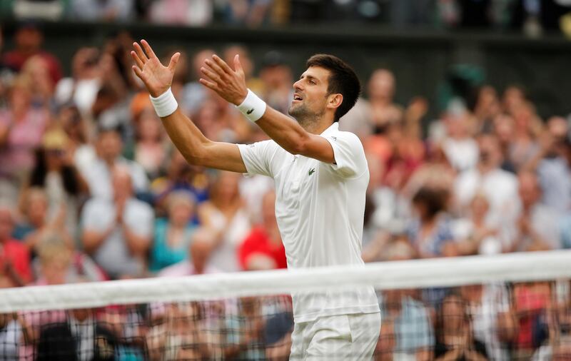 Serbia’s Novak Djokovic celebrates winning the fourth round match against France’s Adrian Mannarino at Wimbledon.