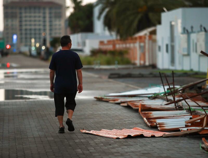 Construction barricades blown over by strong winds at Khalifa City. Victor Besa / The National