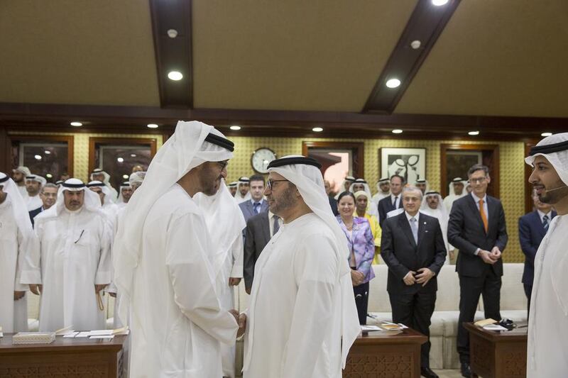 Sheikh Mohammed bin Zayed greets Dr Gargash at the majlis. Mohamed Al Hammadi / Crown Prince Court Abu Dhabi  