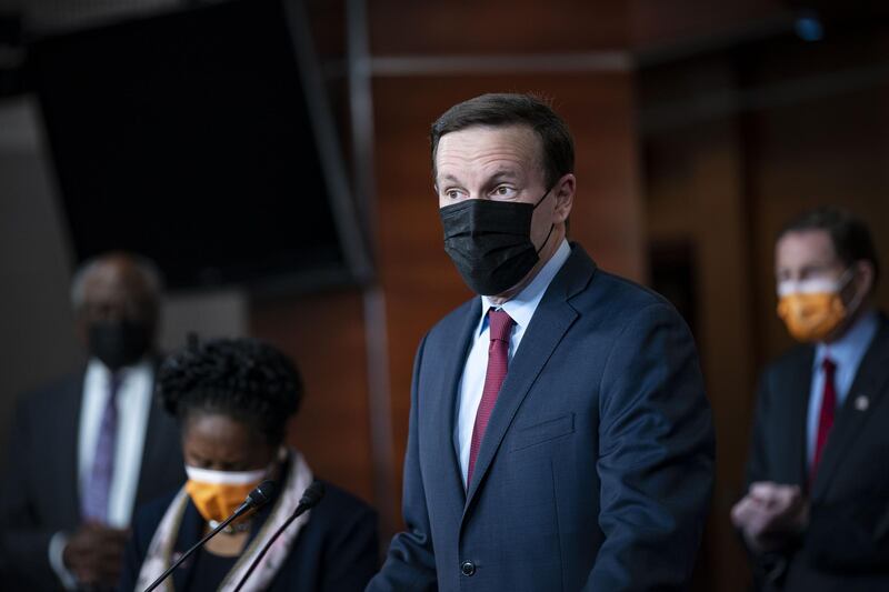 Senator Chris Murphy, a Democrat from Connecticut, wears a protective mask as he speaks during a news conference at the U.S. Capitol in Washington, D.C., U.S., on Thursday, March 11, 2021. President Biden's $1.9 trillion Covid-19 relief bill cleared its final congressional hurdle Wednesday, with the House passing the bill on a 220-to-211 vote, sending it to the president for his signature. Photographer: Al Drago/Bloomberg
