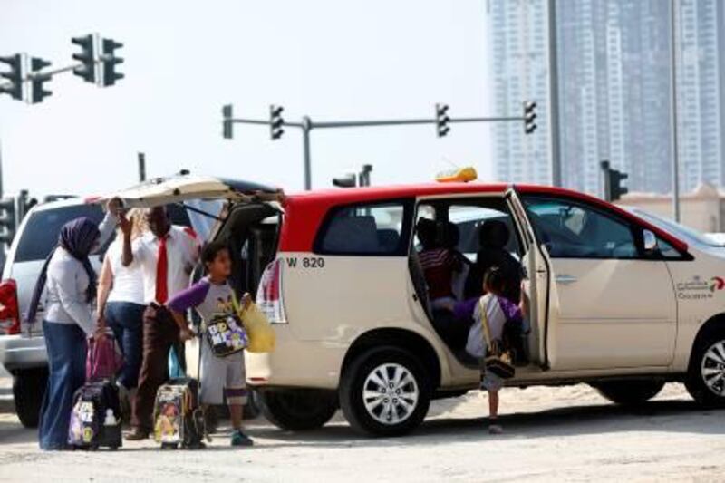 Dubai , United Arab Emirates- October 20, 2011:   Dubai Taxi offers school pick-up service  in Dubai.  ( Satish Kumar / The National )