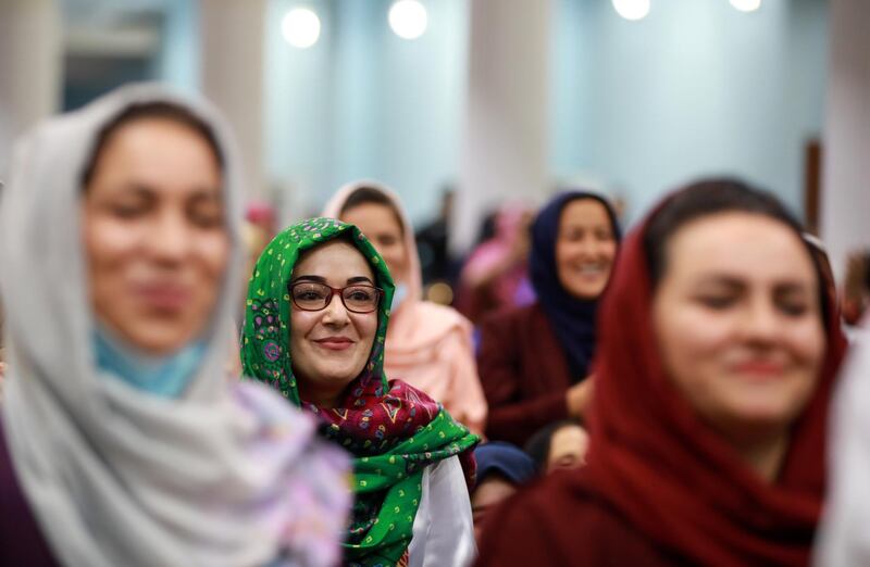 Women attend the closing ceremony of the loya jirga in Kabul.  EPA